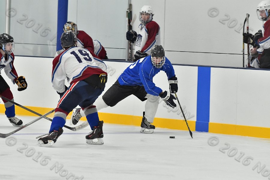 Wheaton College Men\'s Ice Hockey vs Middlesex Community College. - Photo By: KEITH NORDSTROM